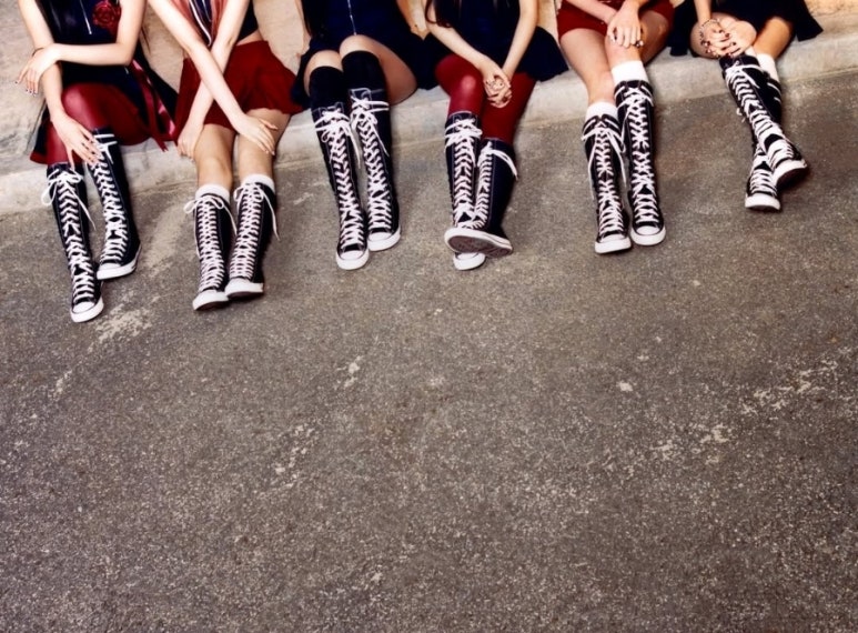 IVE SECRET individual member teasers showing each IVE member with props under red backdrop.
