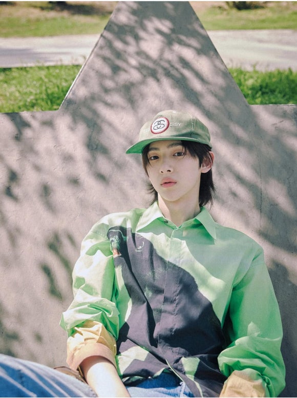 The full group, CORTIS, in concept photos for their debut album 'COLOR OUTSIDE THE LINES,' featuring vibrant colors and unconventional poses.