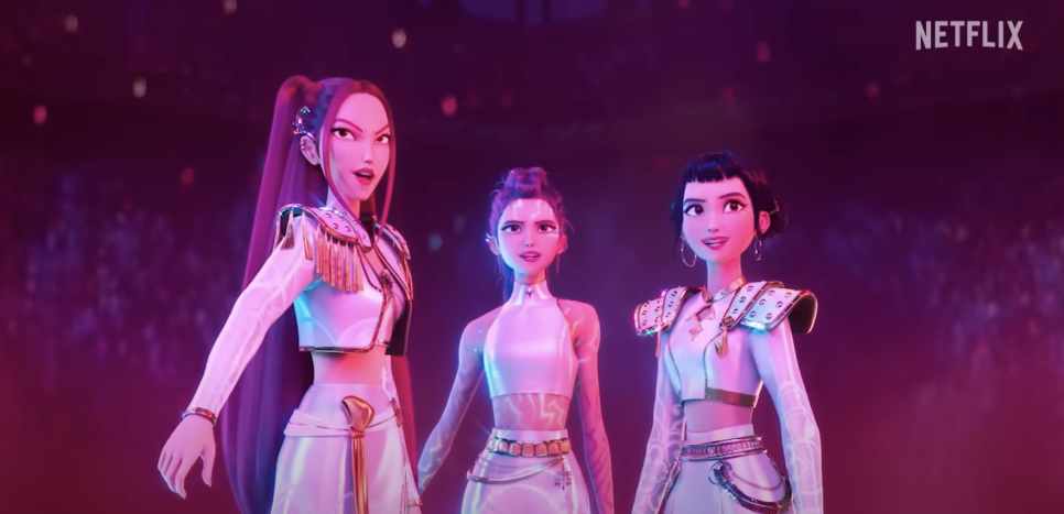 Three heroines of KPop Demon Hunters Netflix glowing with determination on a concert stage
