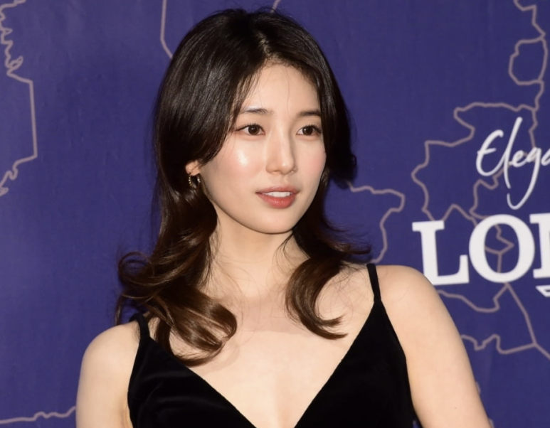 Suzy in black evening gown at luxury event during Suzy marriage rumor