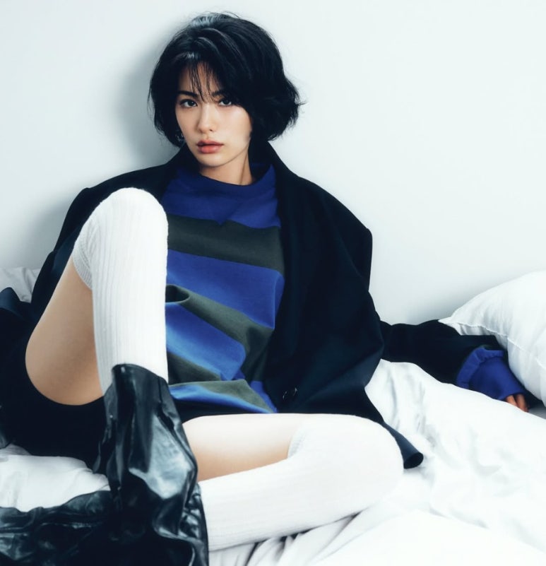 Nana commands the stage in glittering blue during a performance scene—echoes of the fierce energy she brings to "Nana Seventh Heaven 16".