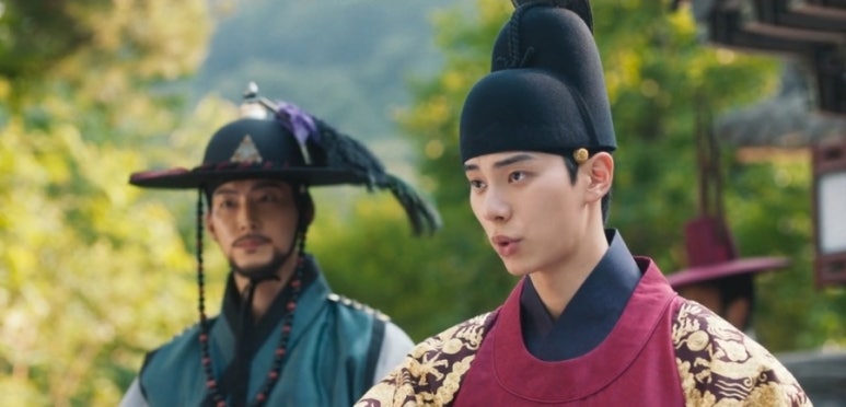 Young king in Tyrant Chef delivering royal command at palace courtyard