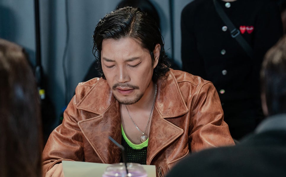 A male actor in a brown leather jacket reading his lines for “Nice to Not Meet You.”