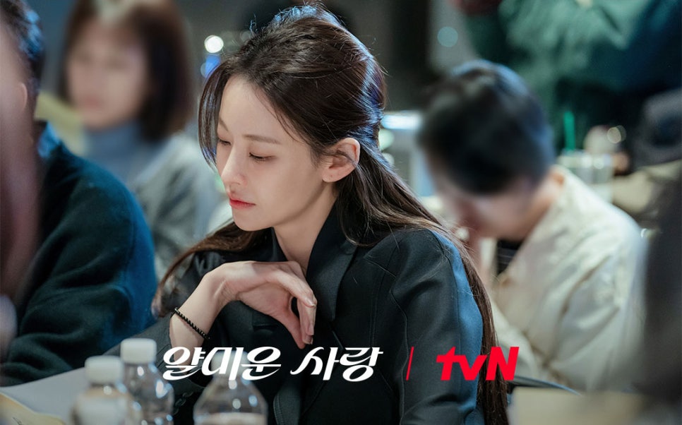 A female lead immersed in the script reading session for tvN’s “Nice to Not Meet You.”