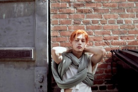 CORTIS debut album sales debut teaser member against brick wall street concept