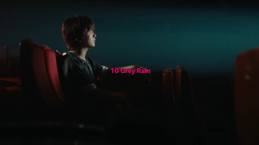 Haechan solo debut tracklist scene – Grey Rain moment inside a theater
