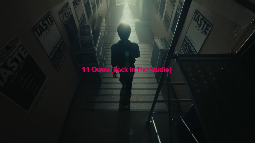 Haechan solo debut cinematic shot – Outro (Back In The Studio) down a hallway of TASTE posters