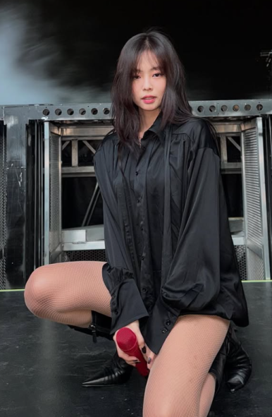 Jennie wearing a nude corset outfit before her solo stage, celebrating her RIAA Gold success
