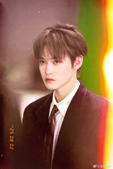 NCT DREAM Beat It Up teaser stylish portrait of member in suit and tie with vintage lighting