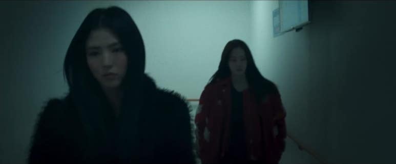 Han So-hee and Jeon Jong-seo in a tense hallway scene from Project Y — capturing the gritty atmosphere that led to the Project Y win