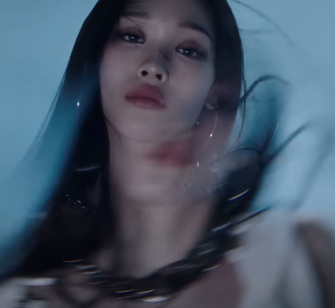 ALLDAY PROJECT female member with sleek long hair and oversized chain — comeback teaser imagery