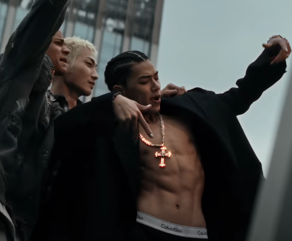 ALLDAY PROJECT male member showing abs with cross pendant and black coat — ALLDAY PROJECT comeback visual concept