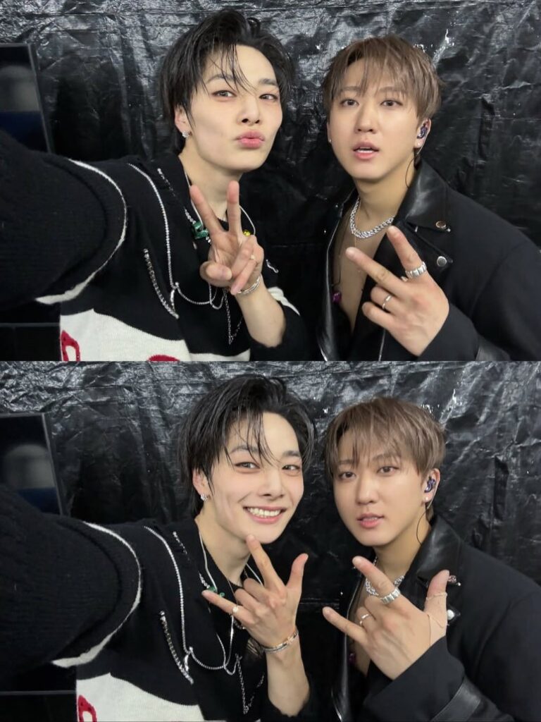 Hyunjin and Changbin of Stray Kids pose backstage in matching black leather outfits at the 2025 KGMA Music Awards.