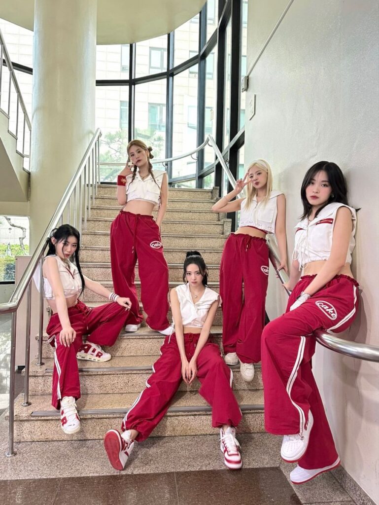 Tunnel Vision ITZY comeback sporty red tracksuit concept at staircase photo session