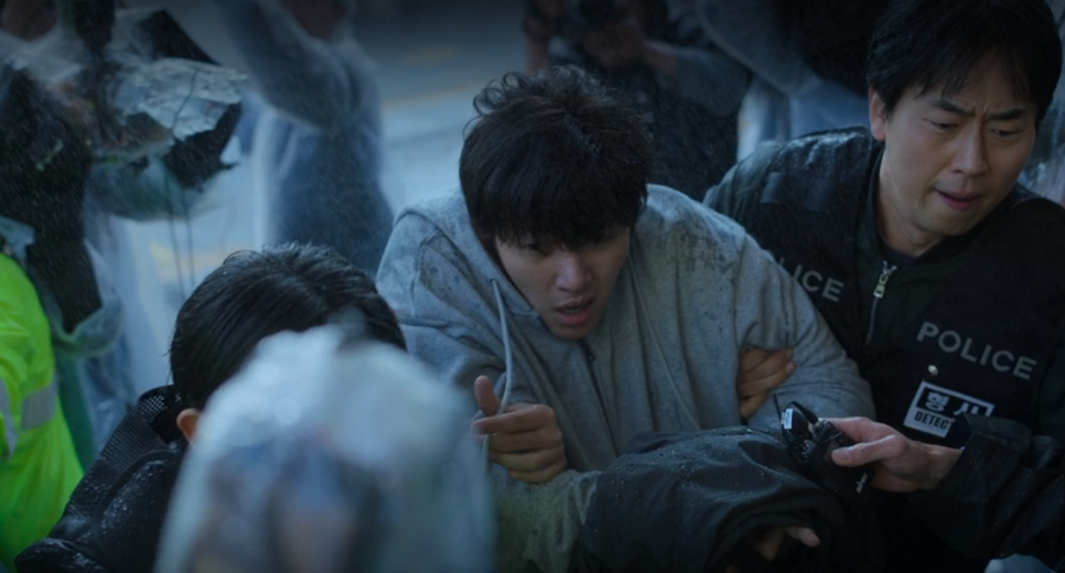 Lead character getting arrested in intense police scene from “Bad Prosecutor”