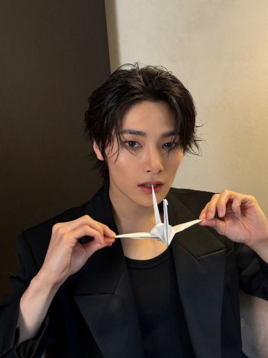 Stray Kids ‘DO IT’ concept shoot featuring origami crane and charismatic gaze