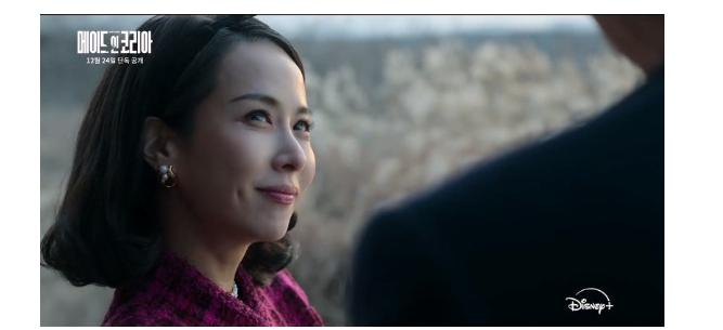 Jo Yeo-jung offers a mysterious smile in Made in Korea, cloaked in elegance and intrigue.