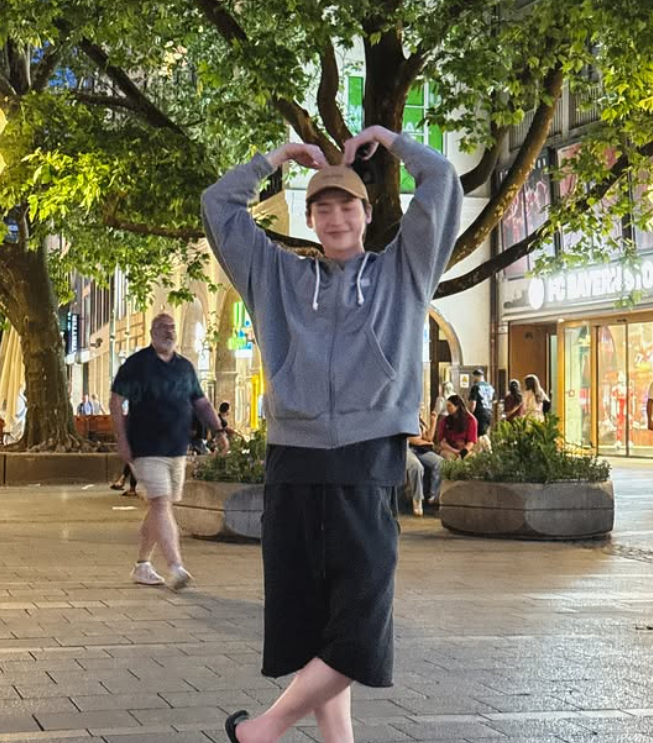 Lee Jong Suk making a heart pose under city lights — grateful to fans despite Manila fanmeeting being canceled